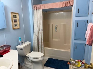 This home is in a 55 plus community with a monthly lot rent of on Crystal Lake Club in Florida - for sale on GolfHomes.com, golf home, golf lot