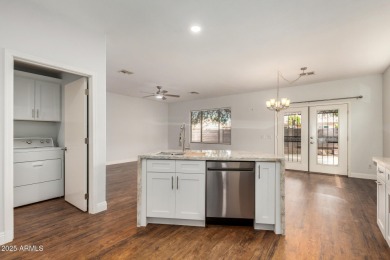 Meticulously renovated 3 bedroom, 2 bathroom home situated on a on Springfield Golf Resort in Arizona - for sale on GolfHomes.com, golf home, golf lot
