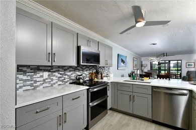 RARE FIRST FLOOR END VERANDA CONDO with den and garage located on Kelly Greens Golf and Country Club in Florida - for sale on GolfHomes.com, golf home, golf lot