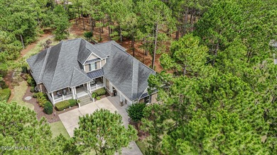 Hello Curb Appeal! A low country inspired 4BR and 3.5BA home on Ocean Ridge Plantation in North Carolina - for sale on GolfHomes.com, golf home, golf lot