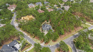 Hello Curb Appeal! A low country inspired 4BR and 3.5BA home on Ocean Ridge Plantation in North Carolina - for sale on GolfHomes.com, golf home, golf lot