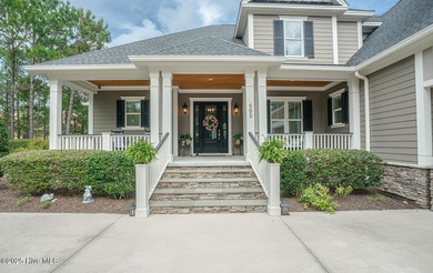 Hello Curb Appeal! A low country inspired 4BR and 3.5BA home on Ocean Ridge Plantation in North Carolina - for sale on GolfHomes.com, golf home, golf lot