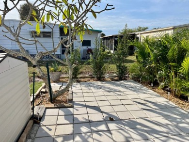 Welcome to your dream home in a picturesque setting located at on Bird Bay Executive Golf Club in Florida - for sale on GolfHomes.com, golf home, golf lot
