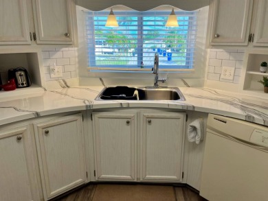 Welcome to your dream home in a picturesque setting located at on Bird Bay Executive Golf Club in Florida - for sale on GolfHomes.com, golf home, golf lot