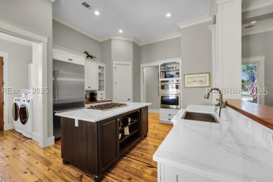 This beautifully renovated single-story home is nestled on a on Oldfield Golf Club in South Carolina - for sale on GolfHomes.com, golf home, golf lot