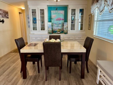 Welcome to your dream home in a picturesque setting located at on Bird Bay Executive Golf Club in Florida - for sale on GolfHomes.com, golf home, golf lot