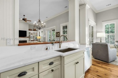 This beautifully renovated single-story home is nestled on a on Oldfield Golf Club in South Carolina - for sale on GolfHomes.com, golf home, golf lot