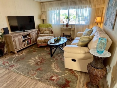 Welcome to your dream home in a picturesque setting located at on Bird Bay Executive Golf Club in Florida - for sale on GolfHomes.com, golf home, golf lot