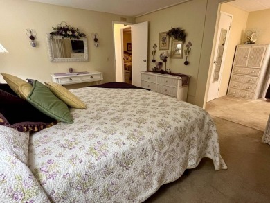Welcome to your dream home in a picturesque setting located at on Bird Bay Executive Golf Club in Florida - for sale on GolfHomes.com, golf home, golf lot