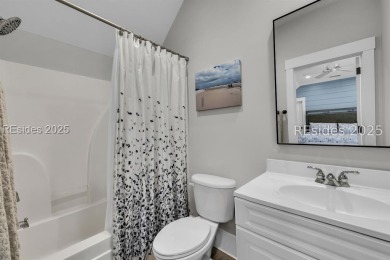 This beautifully renovated single-story home is nestled on a on Oldfield Golf Club in South Carolina - for sale on GolfHomes.com, golf home, golf lot