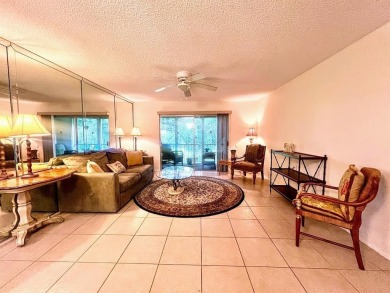 Lovely light  bright 2 bedroom / 2 bathroom corner unit in the on Wynmoor Golf Course in Florida - for sale on GolfHomes.com, golf home, golf lot