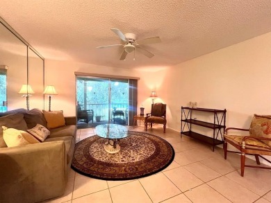 Lovely light  bright 2 bedroom / 2 bathroom corner unit in the on Wynmoor Golf Course in Florida - for sale on GolfHomes.com, golf home, golf lot