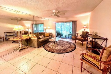 Lovely light  bright 2 bedroom / 2 bathroom corner unit in the on Wynmoor Golf Course in Florida - for sale on GolfHomes.com, golf home, golf lot