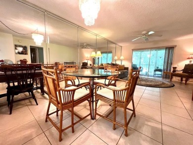 Lovely light  bright 2 bedroom / 2 bathroom corner unit in the on Wynmoor Golf Course in Florida - for sale on GolfHomes.com, golf home, golf lot