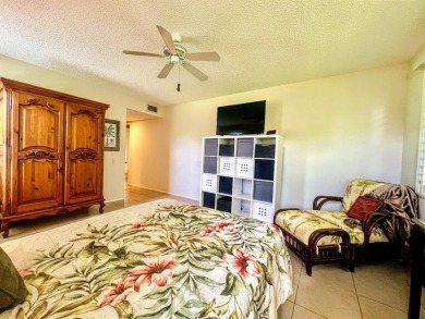Lovely light  bright 2 bedroom / 2 bathroom corner unit in the on Wynmoor Golf Course in Florida - for sale on GolfHomes.com, golf home, golf lot