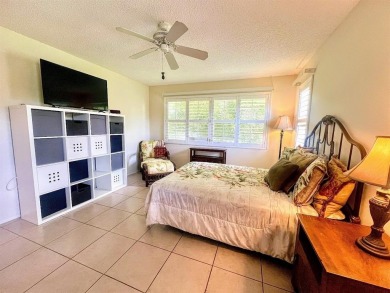 Lovely light  bright 2 bedroom / 2 bathroom corner unit in the on Wynmoor Golf Course in Florida - for sale on GolfHomes.com, golf home, golf lot