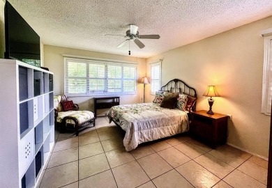 Lovely light  bright 2 bedroom / 2 bathroom corner unit in the on Wynmoor Golf Course in Florida - for sale on GolfHomes.com, golf home, golf lot