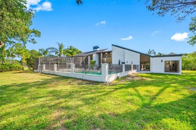 Welcome to 4402 Meadowwood Way - a stunning, storm-proof retreat on Emerald Greens Golf Resort and Country Club in Florida - for sale on GolfHomes.com, golf home, golf lot