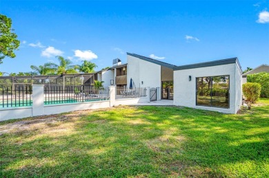 Welcome to 4402 Meadowwood Way - a stunning, storm-proof retreat on Emerald Greens Golf Resort and Country Club in Florida - for sale on GolfHomes.com, golf home, golf lot