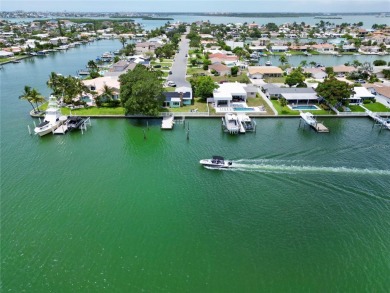 TOP WATERFRONT LOCATION ON AN OVERSIZED 100' WATERFRONT LOT WITH on Treasure Bay Golf and Tennis in Florida - for sale on GolfHomes.com, golf home, golf lot