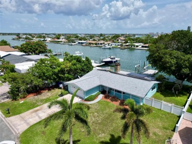 TOP WATERFRONT LOCATION ON AN OVERSIZED 100' WATERFRONT LOT WITH on Treasure Bay Golf and Tennis in Florida - for sale on GolfHomes.com, golf home, golf lot