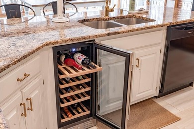 Tucked within the sought-after Estates section of Horseshoe Bend on Horseshoe Bend Country Club in Georgia - for sale on GolfHomes.com, golf home, golf lot