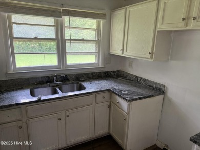 1400 square feet, 3 bed, 2 full bath brick home on Goldsboro on Goldsboro Municipal Golf Course in North Carolina - for sale on GolfHomes.com, golf home, golf lot
