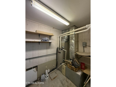 Charming 1,762 sq. ft., 2-bedroom, 3-bath condo located in the on Lake Tansi Village Country Club in Tennessee - for sale on GolfHomes.com, golf home, golf lot