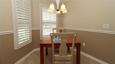 Welcome home to this beautifully maintained Jasmine II 3-bedroom on Glenview Championship Golf and Country Club in Florida - for sale on GolfHomes.com, golf home, golf lot