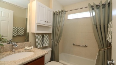 Welcome home to this beautifully maintained Jasmine II 3-bedroom on Glenview Championship Golf and Country Club in Florida - for sale on GolfHomes.com, golf home, golf lot