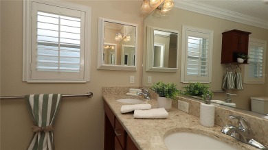 Welcome home to this beautifully maintained Jasmine II 3-bedroom on Glenview Championship Golf and Country Club in Florida - for sale on GolfHomes.com, golf home, golf lot