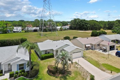 NO BOND 3/2 Maverick home in the Village of Rio Ponderosa. Roof on Tierra Del Sol Golf and Country Club in Florida - for sale on GolfHomes.com, golf home, golf lot