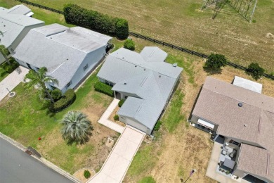 NO BOND 3/2 Maverick home in the Village of Rio Ponderosa. Roof on Tierra Del Sol Golf and Country Club in Florida - for sale on GolfHomes.com, golf home, golf lot