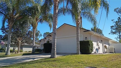 Welcome to 114 Foxhall Lane, where relaxed coastal living meets on Palm Harbor Golf Club in Florida - for sale on GolfHomes.com, golf home, golf lot