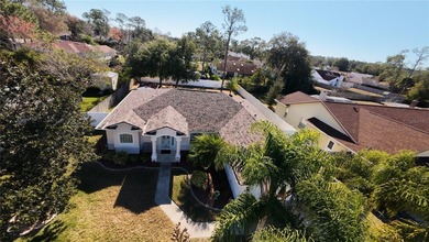 Welcome to 114 Foxhall Lane, where relaxed coastal living meets on Palm Harbor Golf Club in Florida - for sale on GolfHomes.com, golf home, golf lot