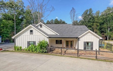 One Level Craftsman style home with Seasonal Lake and Mountain on Mountain Harbour Golf Club in North Carolina - for sale on GolfHomes.com, golf home, golf lot