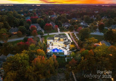 A one-of-a-kind modern masterpiece on Lake Norman. Crafted for on Trump National Golf Club Charlotte in North Carolina - for sale on GolfHomes.com, golf home, golf lot