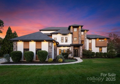 A one-of-a-kind modern masterpiece on Lake Norman. Crafted for on Trump National Golf Club Charlotte in North Carolina - for sale on GolfHomes.com, golf home, golf lot