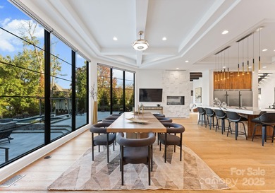 A one-of-a-kind modern masterpiece on Lake Norman. Crafted for on Trump National Golf Club Charlotte in North Carolina - for sale on GolfHomes.com, golf home, golf lot