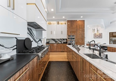 A one-of-a-kind modern masterpiece on Lake Norman. Crafted for on Trump National Golf Club Charlotte in North Carolina - for sale on GolfHomes.com, golf home, golf lot