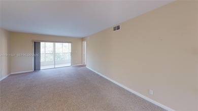 Spacious luxury condo on the north side of Sunrise Lakes Blvd on Sunrise Lakes Phase III in Florida - for sale on GolfHomes.com, golf home, golf lot