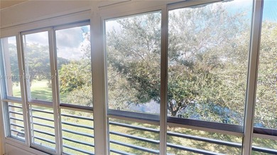 Spacious luxury condo on the north side of Sunrise Lakes Blvd on Sunrise Lakes Phase III in Florida - for sale on GolfHomes.com, golf home, golf lot