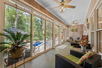 This well-kept brick ranch sits in one of Pawleys Island's most on Heritage Club in South Carolina - for sale on GolfHomes.com, golf home, golf lot