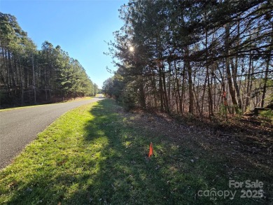 This Badin Lake waterfront lot is located in the prestigious on Old North State Club at Uwharrie Point Golf community in North Carolina - for sale on GolfHomes.com, golf home, golf lot