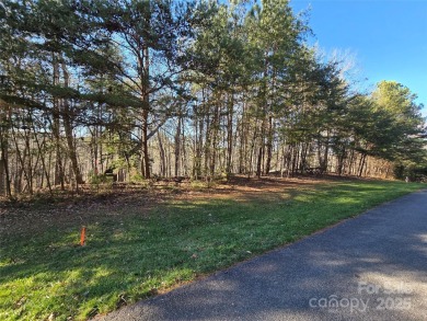 This Badin Lake waterfront lot is located in the prestigious on Old North State Club at Uwharrie Point Golf community in North Carolina - for sale on GolfHomes.com, golf home, golf lot