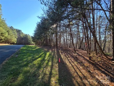 This Badin Lake waterfront lot is located in the prestigious on Old North State Club at Uwharrie Point Golf community in North Carolina - for sale on GolfHomes.com, golf home, golf lot