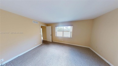 Spacious luxury condo on the north side of Sunrise Lakes Blvd on Sunrise Lakes Phase III in Florida - for sale on GolfHomes.com, golf home, golf lot