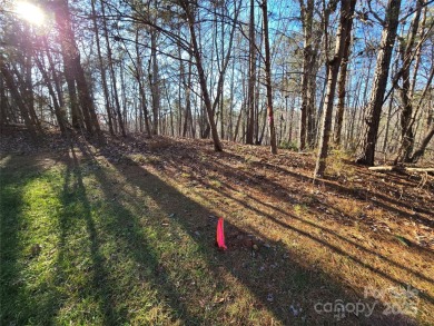 This Badin Lake waterfront lot is located in the prestigious on Old North State Club at Uwharrie Point Golf community in North Carolina - for sale on GolfHomes.com, golf home, golf lot