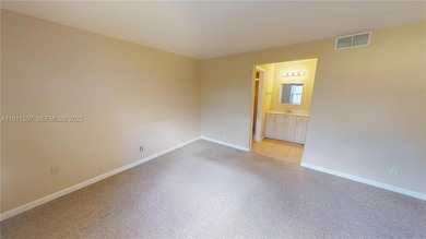 Spacious luxury condo on the north side of Sunrise Lakes Blvd on Sunrise Lakes Phase III in Florida - for sale on GolfHomes.com, golf home, golf lot