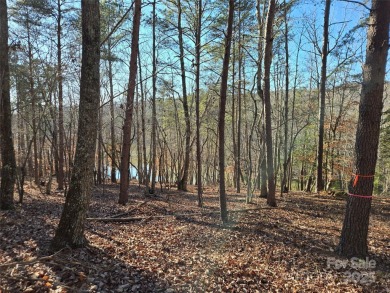 This Badin Lake waterfront lot is located in the prestigious on Old North State Club at Uwharrie Point Golf community in North Carolina - for sale on GolfHomes.com, golf home, golf lot